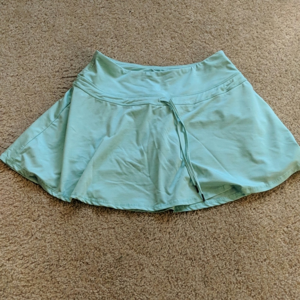 Green tennis skirt with shorts inside